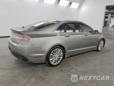 Trzecie zdjęcie samochodu z tyłu: 2016 LINCOLN MKZ VIN:3LN6L2G91GR626941 - miniatura