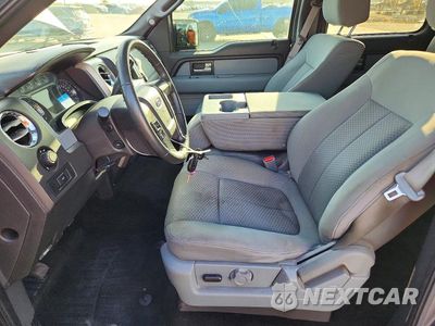 Zdjęcie 7 z 12 samochodu: 2014 FORD F150 SUPERCREW VIN:1FTFW1CF3EKF90091 - miniatura