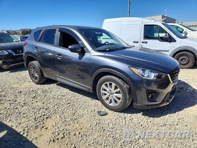 Czwarte zdjęcie samochodu z boku: 2016 MAZDA CX-5 TOURING VIN:JM3KE2CY3G0881074 - miniatura