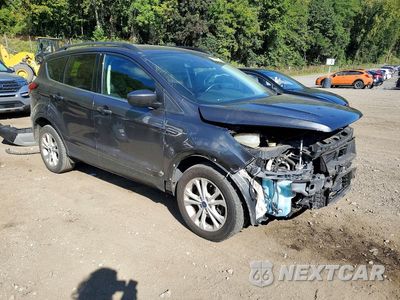 Czwarte zdjęcie samochodu z boku: 2019 FORD ESCAPE SEL VIN:1FMCU9HD1KUA84561 - miniatura