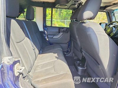 Zdjęcie 10 z 12 samochodu: 2013 JEEP WRANGLER UNLIMITED SAHARA VIN:1C4BJWEG4DL608607 - miniatura