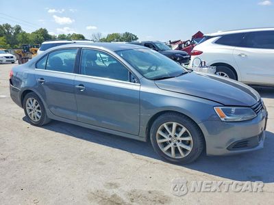 Czwarte zdjęcie samochodu z boku: 2014 VOLKSWAGEN JETTA SE VIN:3VWD17AJ6EM284315 - miniatura