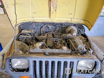 Zdjęcie 11 z 12 samochodu: 1991 JEEP WRANGLER VIN:1J4FY19P9SP308328 - miniatura