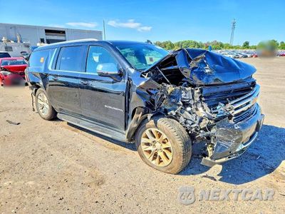 Czwarte zdjęcie samochodu z boku: 2021 CHEVROLET SUBURBAN K1500 PREMIER VIN:1GNSKFKD8MR338647 - miniatura