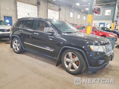 Czwarte zdjęcie samochodu z boku: 2012 JEEP GRAND CHEROKEE OVERLAND VIN:1C4RJFCT1CC349412 - miniatura