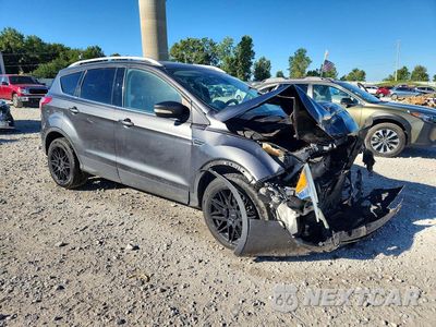 Czwarte zdjęcie samochodu z boku: 2015 FORD ESCAPE TITANIUM VIN:1FMCU9J94FUB11862 - miniatura