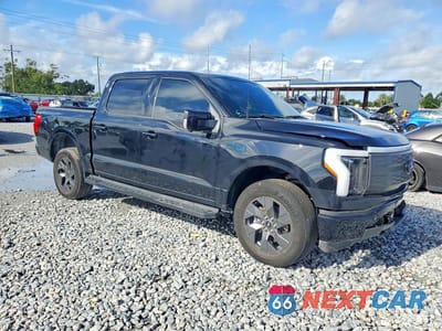 Czwarte zdjęcie samochodu z boku: 2024 FORD F150 LIGHTNING LARIAT VIN:1FT6W5L76RWG08517 - miniatura