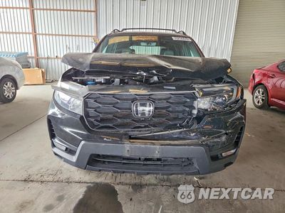 Piąte zdjęcie samochodu w środku: 2022 HONDA PASSPORT EXL VIN:5FNYF8H5XNB028266 - miniatura