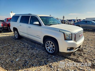 Czwarte zdjęcie samochodu z boku: 2015 GMC YUKON XL DENALI VIN:1GKS2JKJ9FR736782 - miniatura