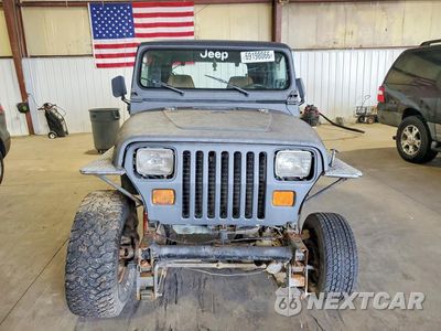 Piąte zdjęcie samochodu w środku: 1991 JEEP WRANGLER VIN:1J4FY19P9SP308328 - miniatura