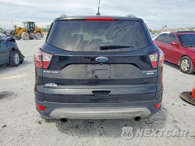 Zdjęcie 6 z 13 samochodu: 2017 FORD ESCAPE TITANIUM VIN:1FMCU0J9XHUE65142 - miniatura