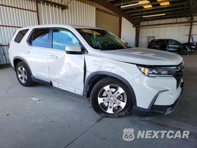 Czwarte zdjęcie samochodu z boku: 2023 HONDA PILOT EXL VIN:5FNYG1H54PB039609 - miniatura