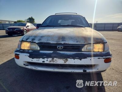 Piąte zdjęcie samochodu w środku: 1995 TOYOTA COROLLA DX VIN:JT2AE09V7S0097827 - miniatura
