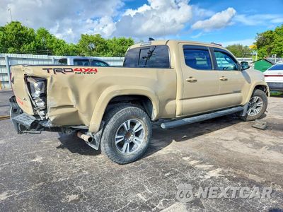 Trzecie zdjęcie samochodu z tyłu: 2019 TOYOTA TACOMA TRD SPORT VIN:3TMDZ5BN4KM066516 - miniatura
