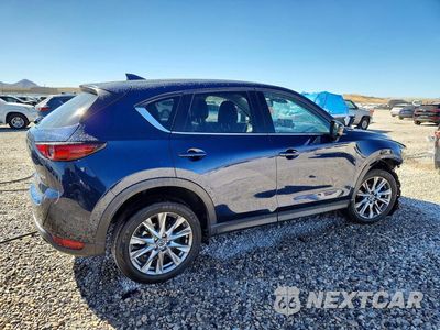 Trzecie zdjęcie samochodu z tyłu: 2021 MAZDA CX-5 GRAND TOURING VIN:JM3KFBDM8M0325038 - miniatura