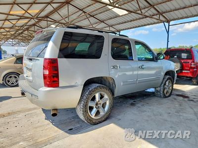 Trzecie zdjęcie samochodu z tyłu: 2014 CHEVROLET TAHOE K1500 LTZ VIN:1GNSKCE0XER172415 - miniatura