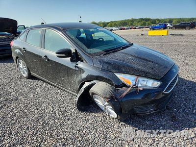 Czwarte zdjęcie samochodu z boku: 2018 FORD FOCUS SE VIN:1FADP3F2XJL278062 - miniatura