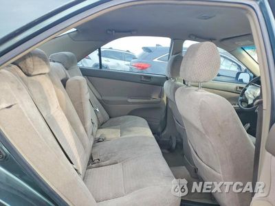 Zdjęcie 10 z 12 samochodu: 2002 TOYOTA CAMRY LE VIN:JTDBE32K820103096 - miniatura