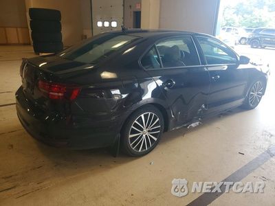 Trzecie zdjęcie samochodu z tyłu: 2016 VOLKSWAGEN JETTA SPORT VIN:3VWD17AJ3GM406647 - miniatura