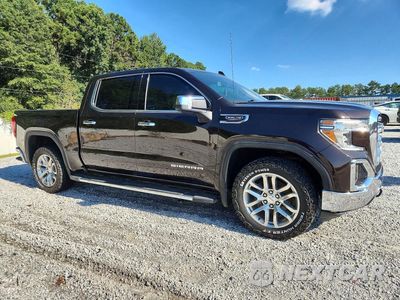 Czwarte zdjęcie samochodu z boku: 2019 GMC SIERRA C1500 SLT VIN:3GTP8DED1KG155651 - miniatura