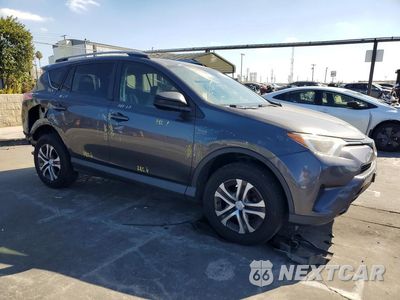 Czwarte zdjęcie samochodu z boku: 2017 TOYOTA RAV4 LE VIN:JTMZFREV1HJ100743 - miniatura