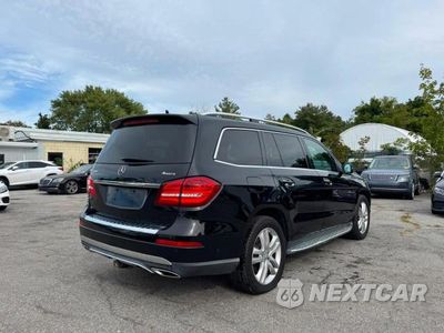 Czwarte zdjęcie samochodu z boku: 2017 MERCEDES-BENZ GLS 450 4MATIC VIN:4JGDF6EEXHA832616 - miniatura