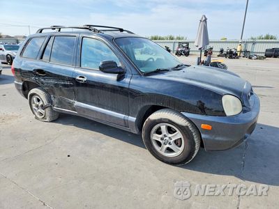 Czwarte zdjęcie samochodu z boku: 2004 HYUNDAI SANTA FE GLS VIN:KM8SC13E84U652114 - miniatura