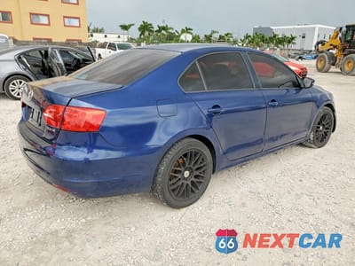 Trzecie zdjęcie samochodu z tyłu: 2012 VOLKSWAGEN JETTA SE VIN:3VWDP7AJ4CM380715 - miniatura