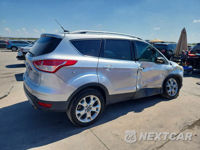 Trzecie zdjęcie samochodu z tyłu: 2016 FORD ESCAPE TITANIUM VIN:1FMCU0JX3GUC57374 - miniatura