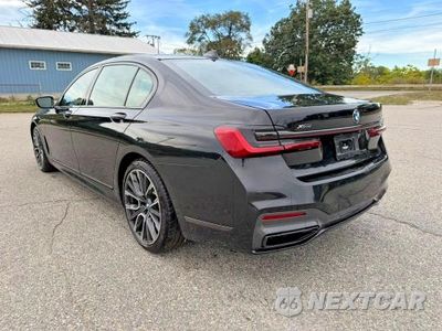 Trzecie zdjęcie samochodu z tyłu: 2022 BMW 740 XI VIN:WBA7T4C03NCK23662 - miniatura