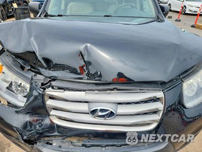 Zdjęcie 12 z 13 samochodu: 2012 HYUNDAI SANTA FE GLS VIN:5XYZGDAB1CG139692 - miniatura
