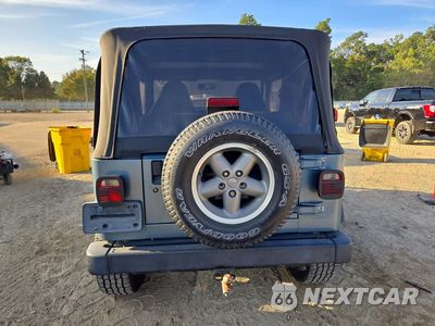 Zdjęcie 6 z 12 samochodu: 1998 JEEP WRANGLER / TJ SPORT VIN:1J4FY19S3WP760561 - miniatura
