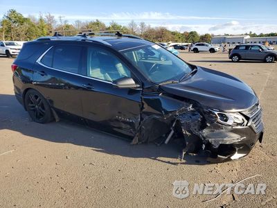 Czwarte zdjęcie samochodu z boku: 2020 CHEVROLET EQUINOX LT VIN:2GNAXVEX9L6215382 - miniatura
