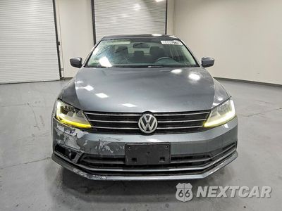 Piąte zdjęcie samochodu w środku: 2017 VOLKSWAGEN JETTA S VIN:3VW2B7AJ4HM371655 - miniatura