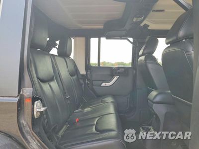 Zdjęcie 10 z 12 samochodu: 2016 JEEP WRANGLER UNLIMITED SAHARA VIN:1C4BJWEG8GL144113 - miniatura