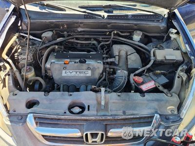 Zdjęcie 12 z 13 samochodu: 2004 HONDA CR-V EX VIN:JHLRD78804C053254 - miniatura