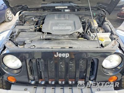 Zdjęcie 12 z 13 samochodu: 2012 JEEP WRANGLER UNLIMITED SAHARA VIN:1C4BJWEG1CL279766 - miniatura