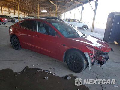 Czwarte zdjęcie samochodu z boku: 2022 TESLA MODEL 3 VIN:5YJ3E1EB7NF285464 - miniatura