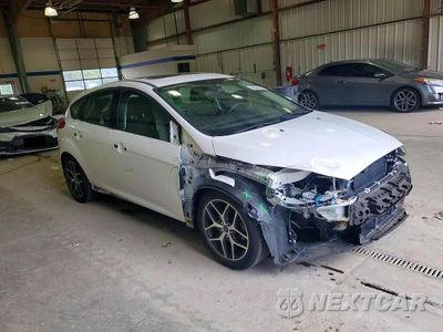 Czwarte zdjęcie samochodu z boku: 2017 FORD FOCUS SEL VIN:1FADP3M25HL213049 - miniatura