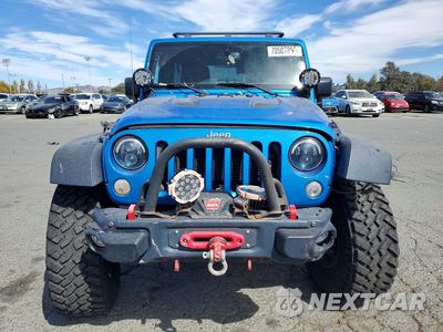 Piąte zdjęcie samochodu w środku: 2016 JEEP WRANGLER UNLIMITED RUBICON VIN:1C4BJWFG0GL270092 - miniatura