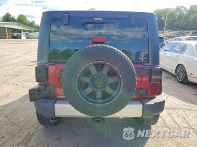 Zdjęcie 6 z 13 samochodu: 2012 JEEP WRANGLER UNLIMITED SAHARA VIN:1C4HJWEG0CL122868 - miniatura