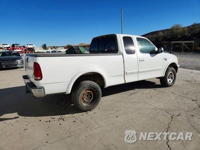 Trzecie zdjęcie samochodu z tyłu: 2002 FORD F150 VIN:1FTRX18W52NB34039 - miniatura