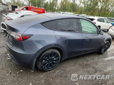 Trzecie zdjęcie samochodu z tyłu: 2023 TESLA MODEL Y VIN:7SAYGAEE3PF708430 - miniatura