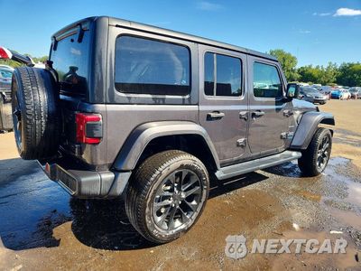 Trzecie zdjęcie samochodu z tyłu: 2022 JEEP WRANGLER UNLIMITED SAHARA 4XE VIN:1C4JJXP67NW234516 - miniatura