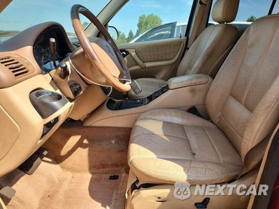 Zdjęcie 7 z 12 samochodu: 2000 MERCEDES-BENZ ML 320 VIN:4JGAB54E4YA147425 - miniatura