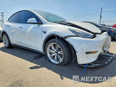 Czwarte zdjęcie samochodu z boku: 2022 TESLA MODEL Y VIN:7SAYGDEE9NF427229 - miniatura