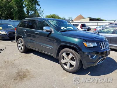 Czwarte zdjęcie samochodu z boku: 2014 JEEP GRAND CHEROKEE OVERLAND VIN:1C4RJFCG9EC587370 - miniatura