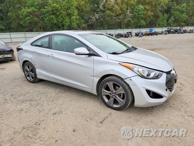 Czwarte zdjęcie samochodu z boku: 2013 HYUNDAI ELANTRA COUPE SE VIN:KMHDH6AEXDU003148 - miniatura