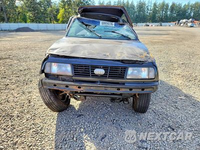 Piąte zdjęcie samochodu w środku: 1993 GEO TRACKER VIN:2CNBJ18UXP6935073 - miniatura
