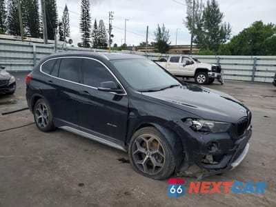 Czwarte zdjęcie samochodu z boku: 2018 BMW X1 SDRIVE28I VIN:WBXHU7C37J5H41746 - miniatura